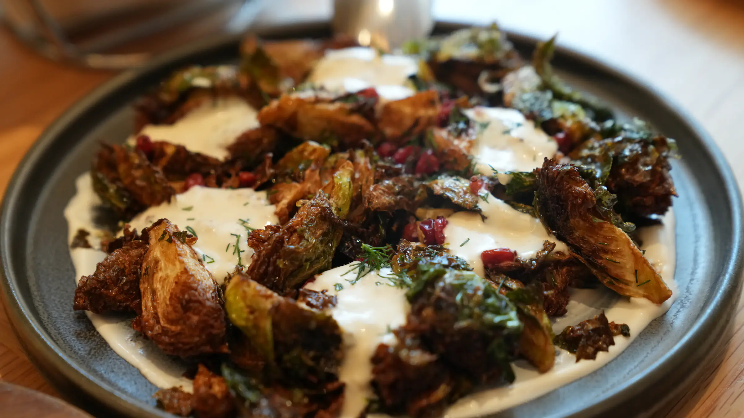 Crispy roasted Brussels sprouts in a cast iron skillet